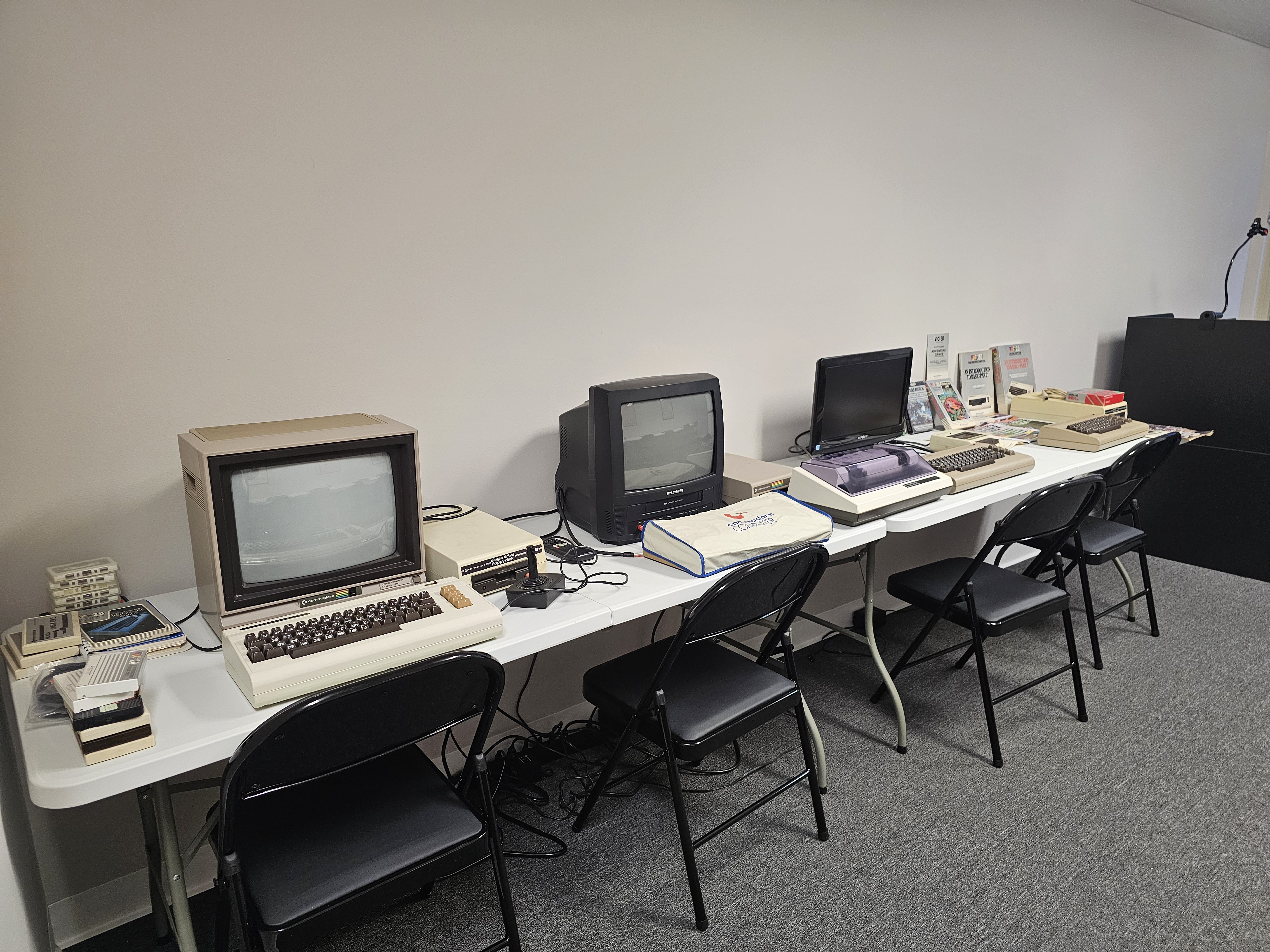 Breadboard projects and test equipment on tables